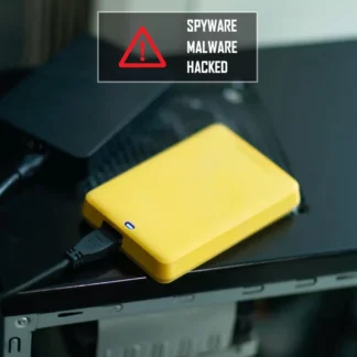 yellow external hard drive with threat of spyware