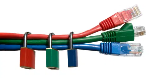 Three multi-colored computer cables secured with padlocks